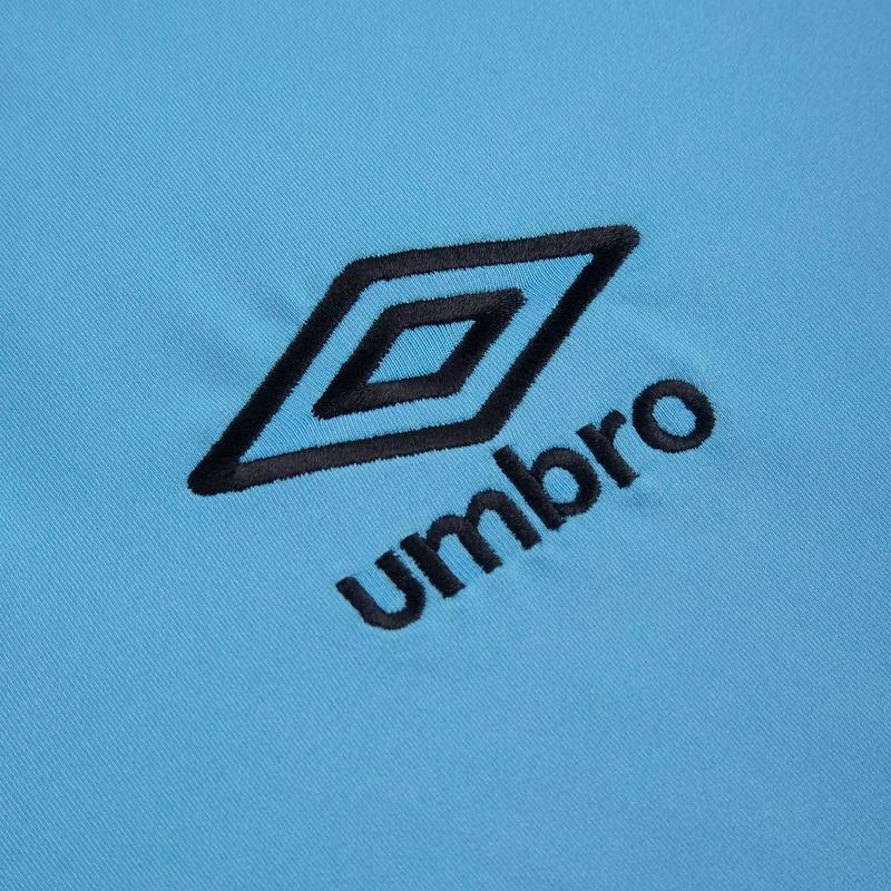 camiseta-titular-belgrano-umbro-2024