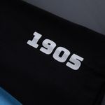 remera-salida-belgrano-umbro-celeste