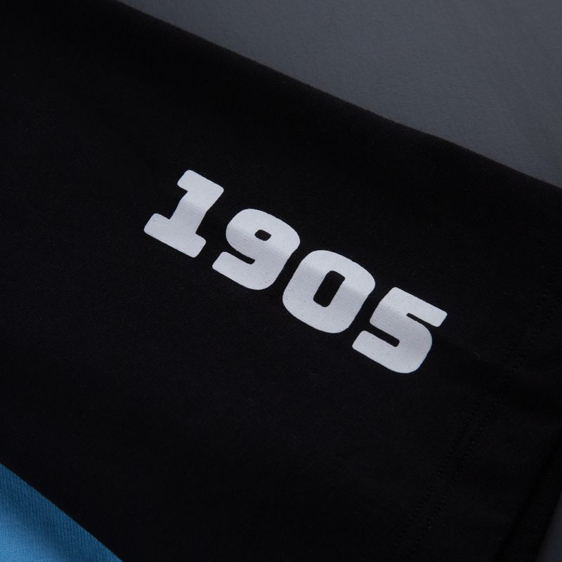 remera-salida-belgrano-umbro-celeste